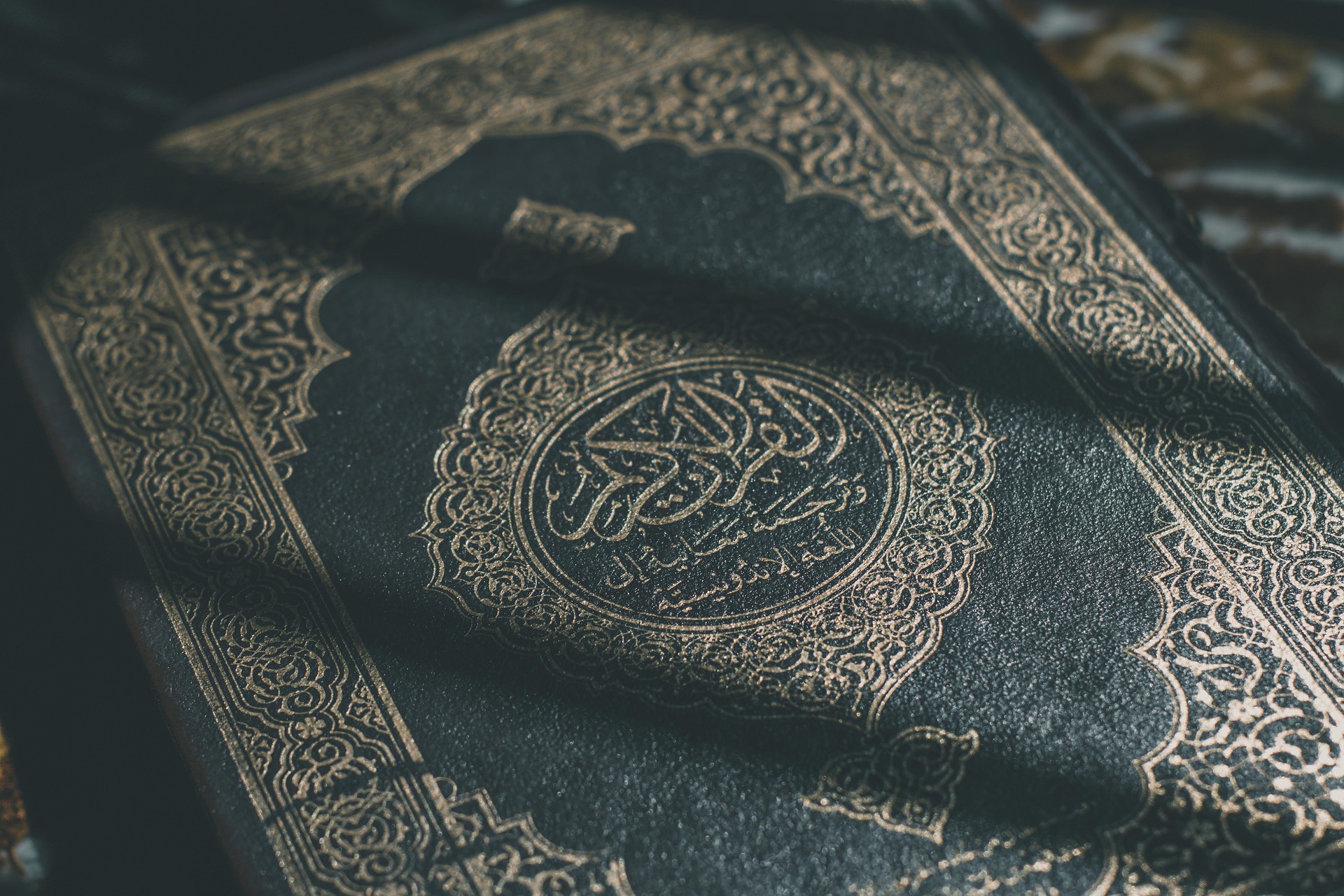 Koran als Symbol f�r den religi�sen Rahmen